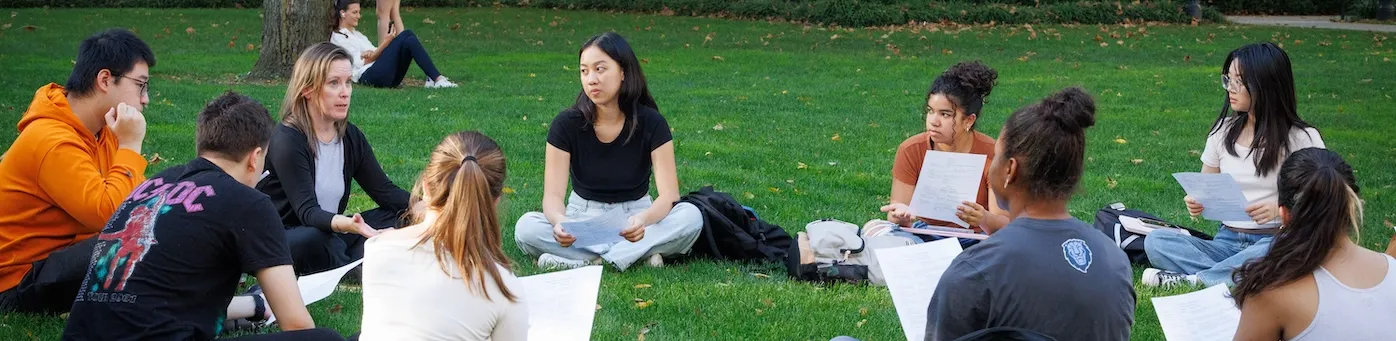 Columbia students having a class discussion outside on the Morningside campus